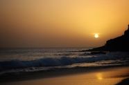 黄昏大海落日余晖海岸风景摄影图片