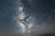 夜晚星空飞机摄影图片