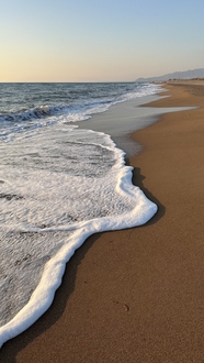 希腊海边沙滩海浪摄影图片