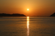 黄昏夕阳西下海滨风光摄影图片